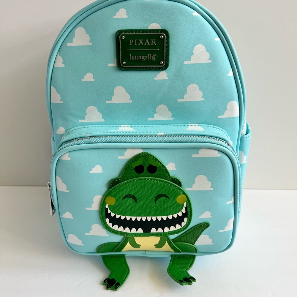 Loungefly toy story Pixar Rex. He actually Roars.